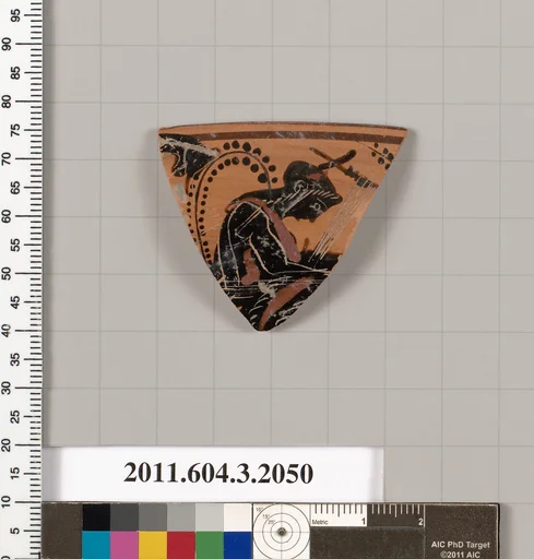 Terracotta rim fragment of a kylix (drinking cup)