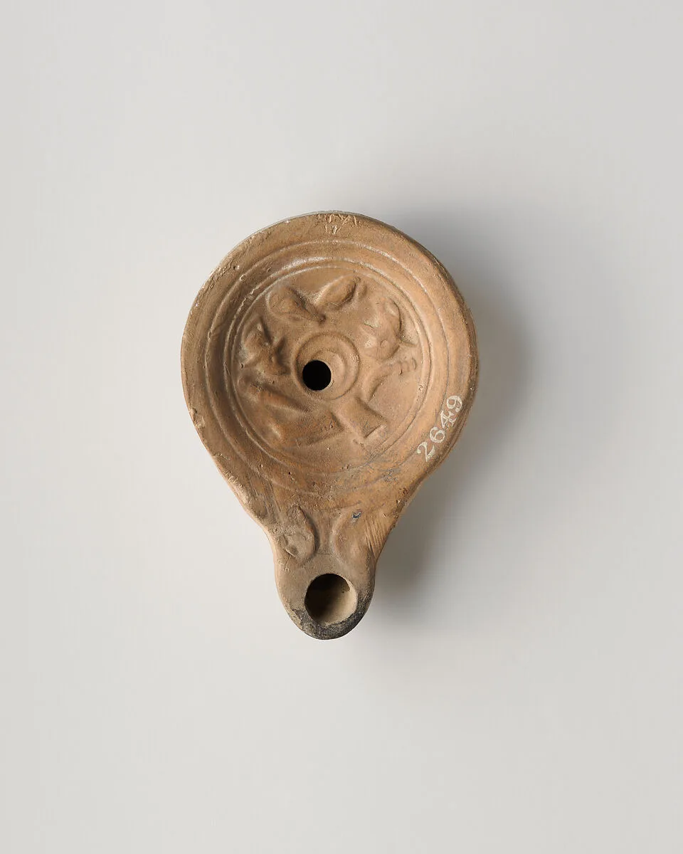 Terracotta oil lamp — Unknown