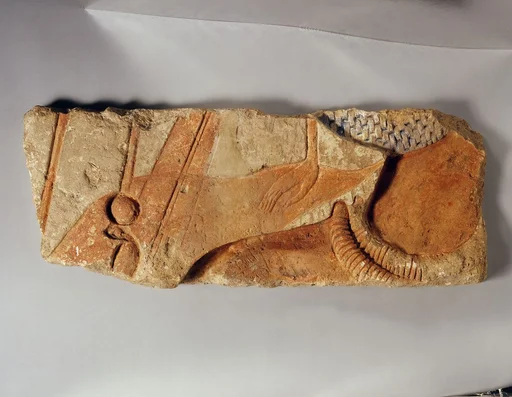 Relief with royal male wearing gold of honor