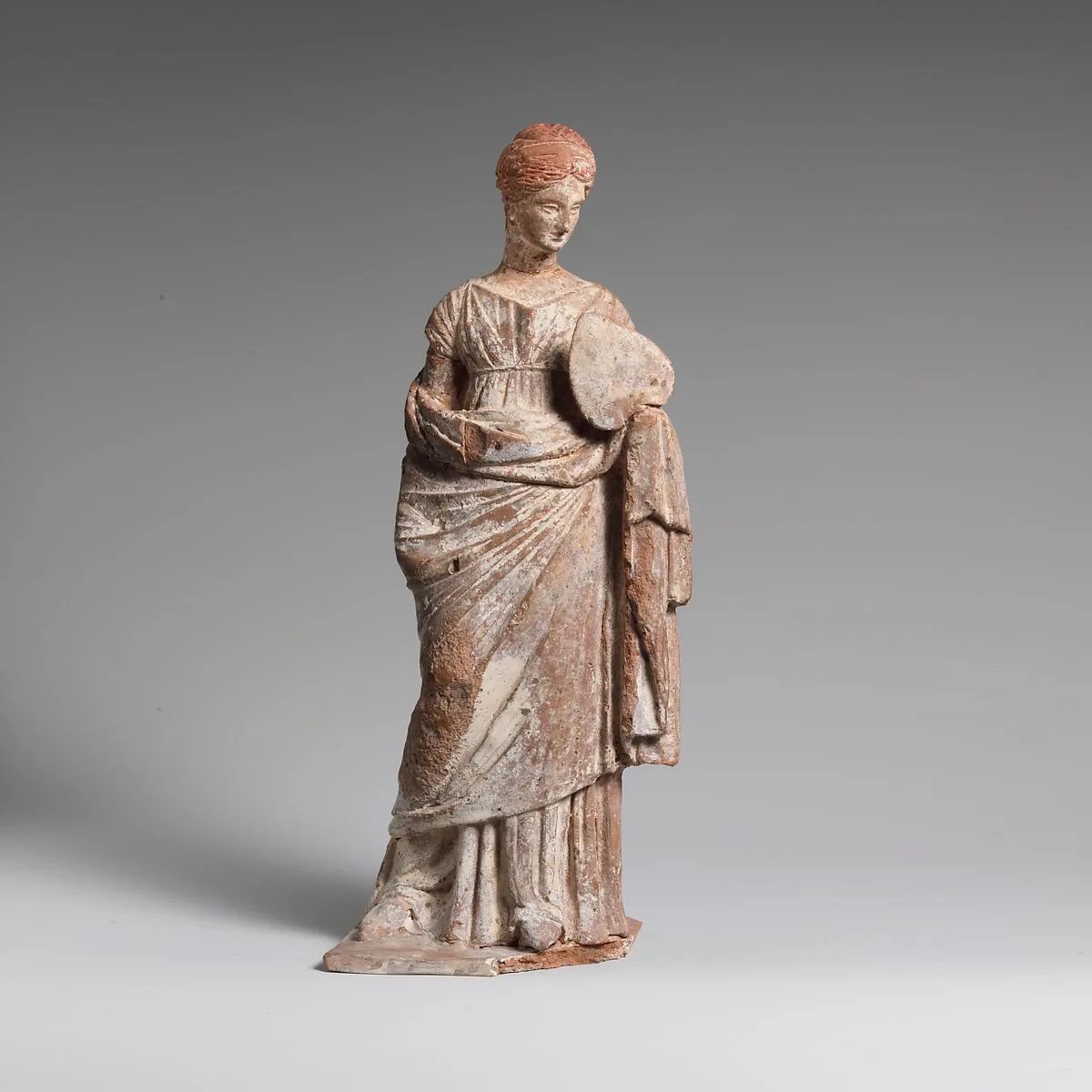 Terracotta statuette of a woman — Unknown