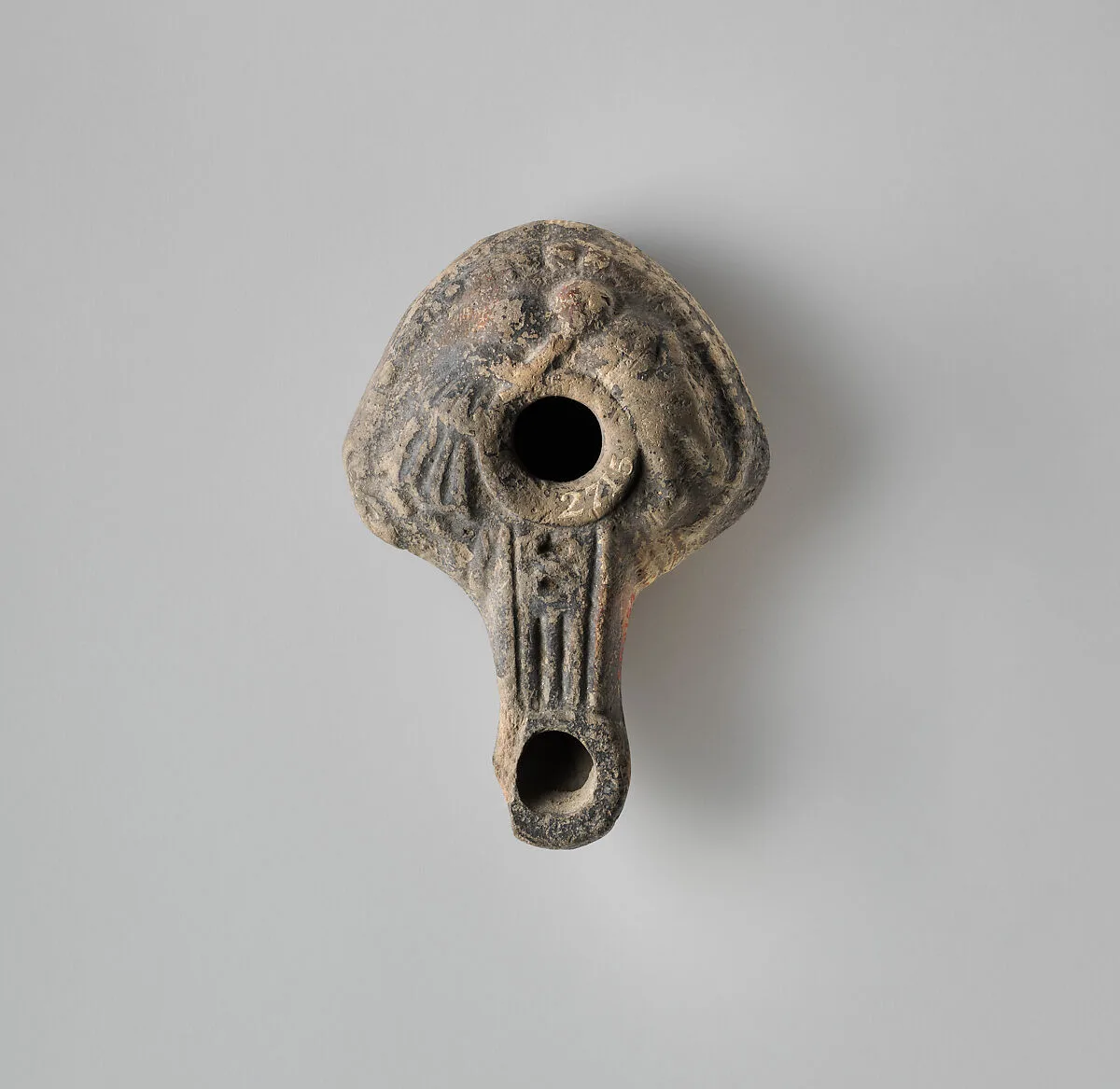 Terracotta oil lamp — Unknown