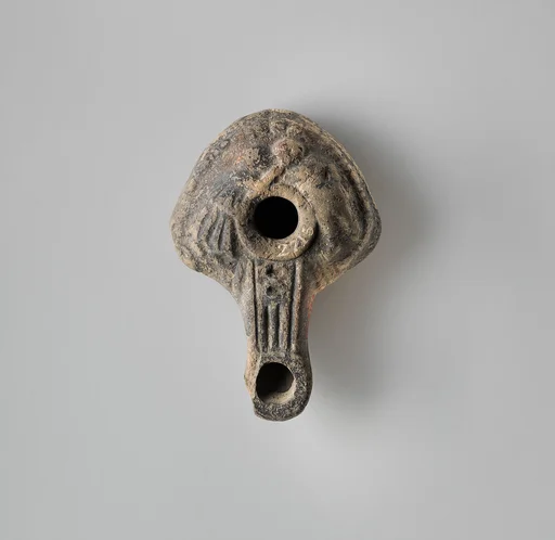 Terracotta oil lamp