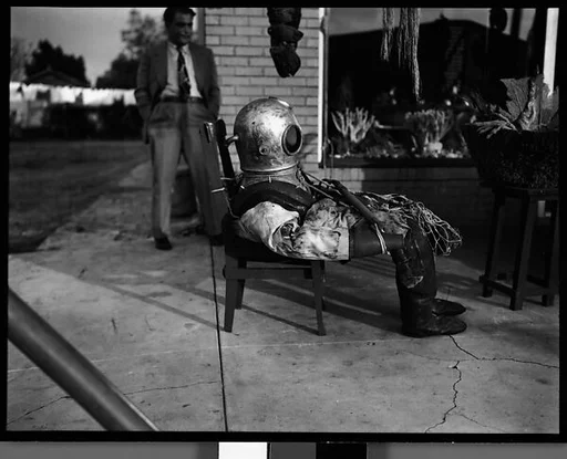 [Sponge Diver's Suit in Front of Mermaid Curio Shoppe, Florida]