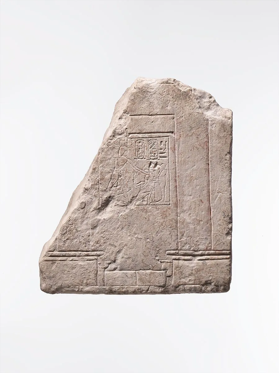 Relief showing part of a temple of Ptah with Haremhab smiting an enemy in front of the god — Unknown