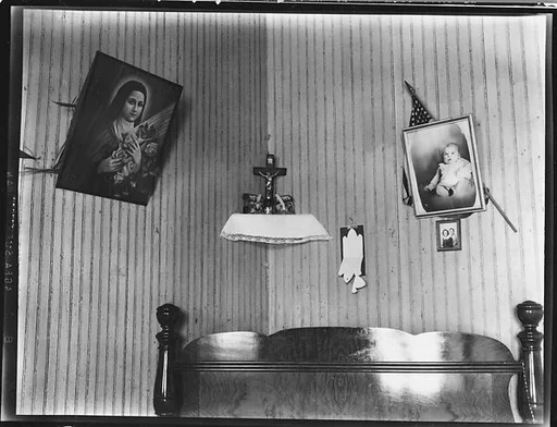 [Bedroom Interior with Religious and Family Pictures on Wall, Biloxi, Mississippi]