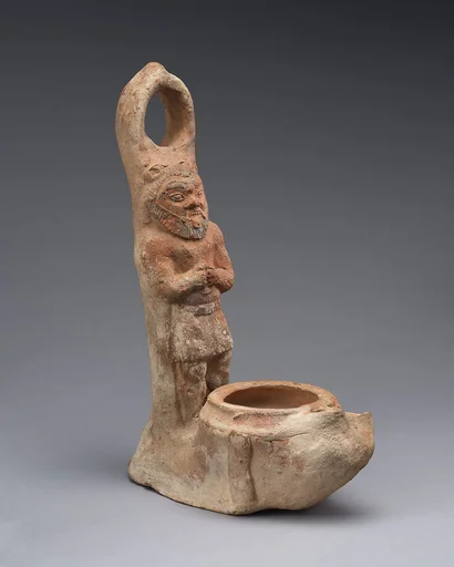 Terracotta lamp representing Bes