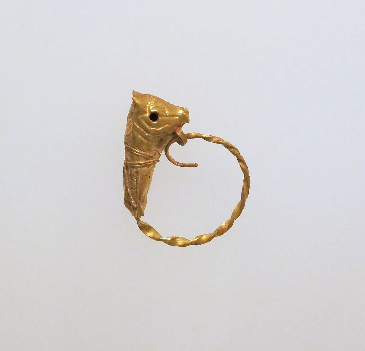 Gold earring with head of a bull — Unknown