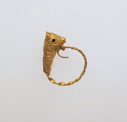 Gold earring with head of a bull