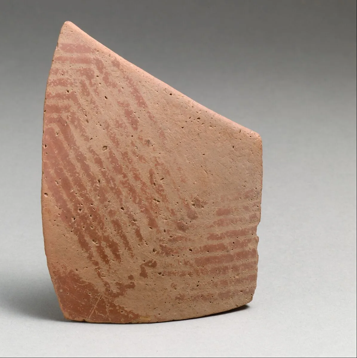 Terracotta rim fragment with linear decoration — Unknown