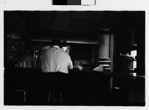 [Two 35mm Film Frames: Man Seated at Bar, From Behind, New York City]