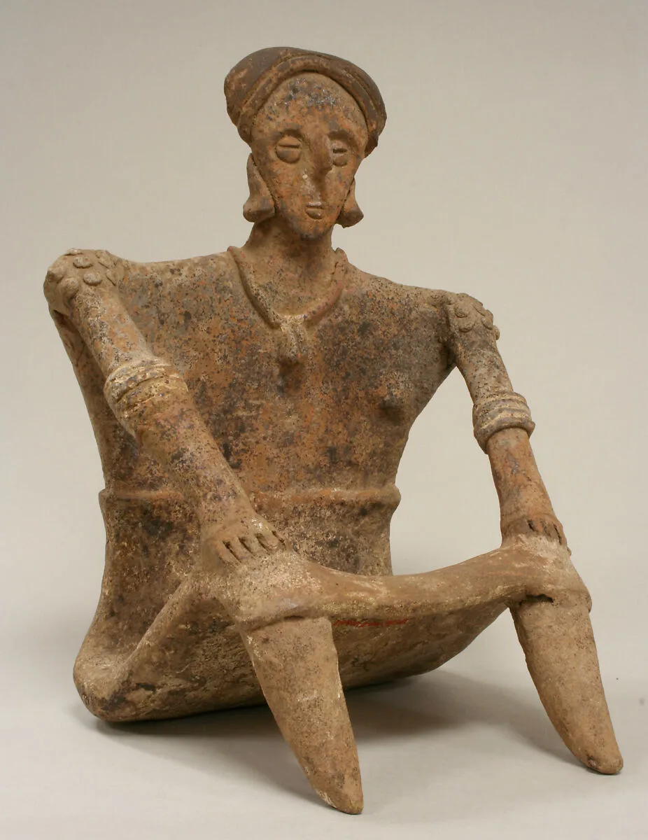 Seated Female Figure — Unknown