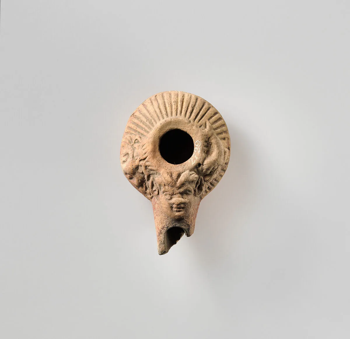 Terracotta oil lamp — Unknown