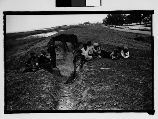 [Children on Levee, From Automobile, New Orleans Vicinity, Louisiana]
