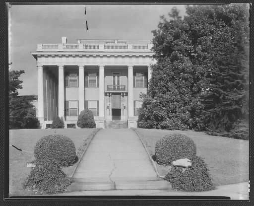 [Greek Revival Building with Awning Over Doorway, From End of Walkway, Macon, Georgia?]