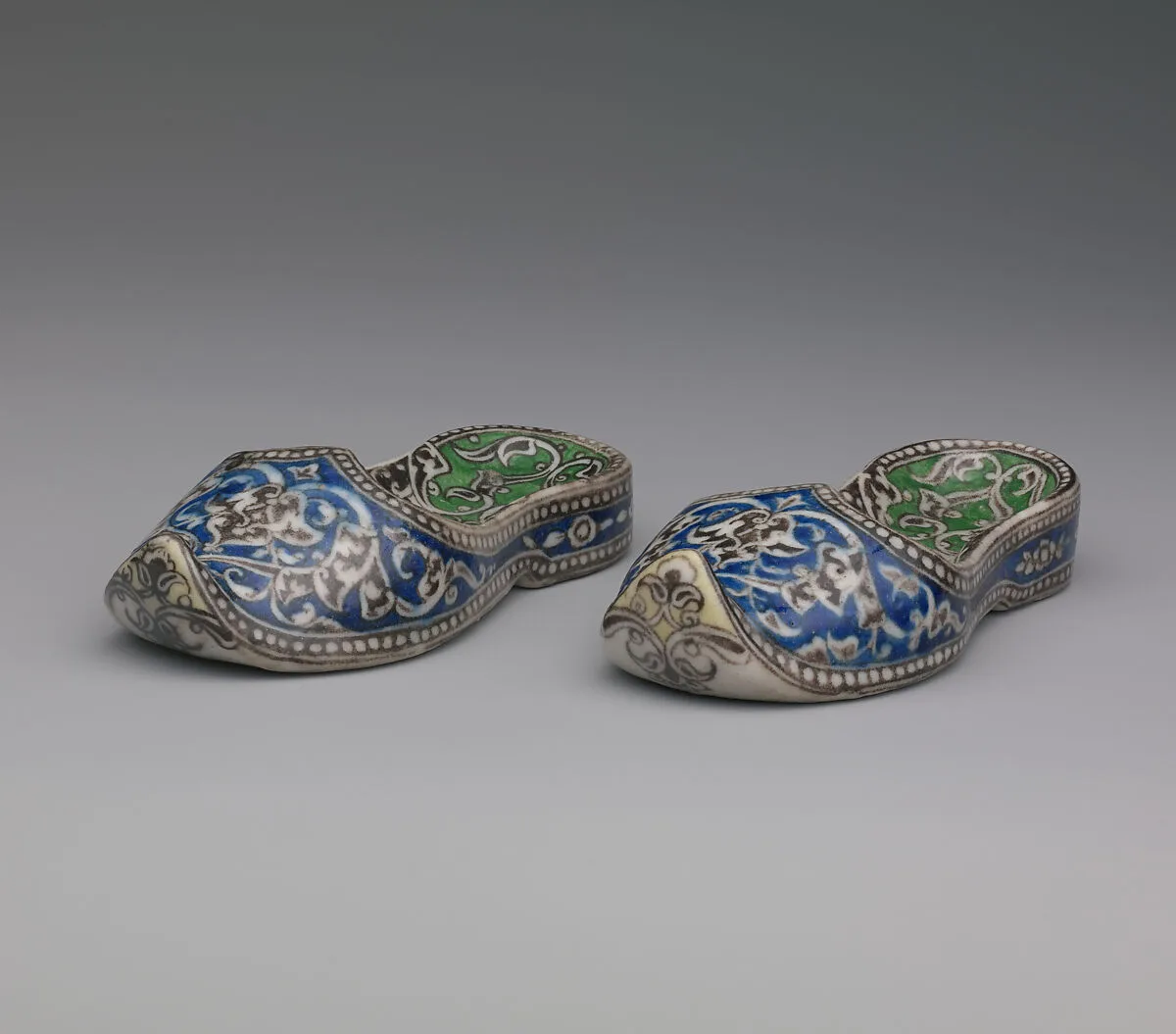 Pair of Qajar Ceramic Slippers — Unknown