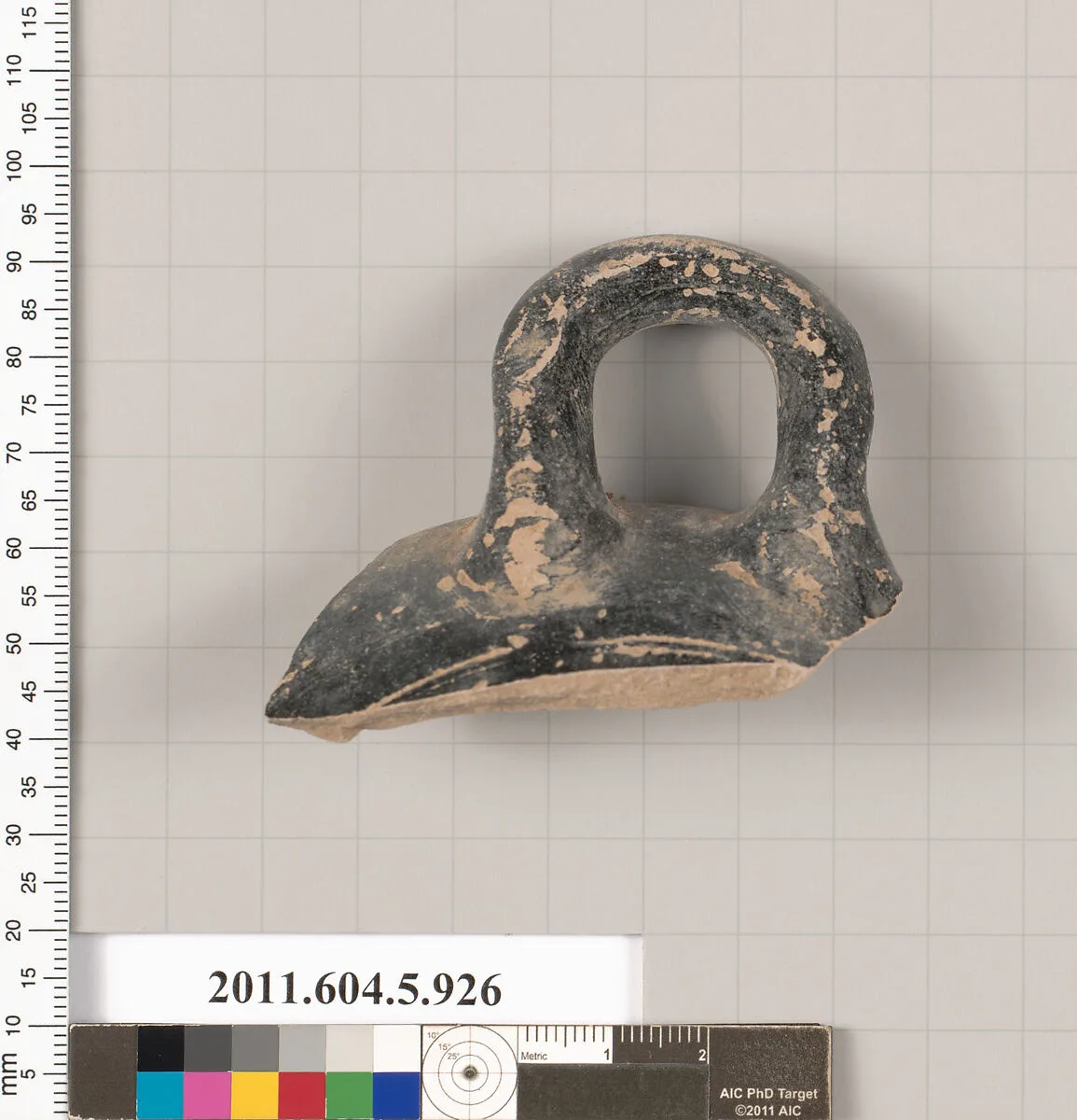 Terracotta rim fragment of a kylix (drinking cup)? — Unknown