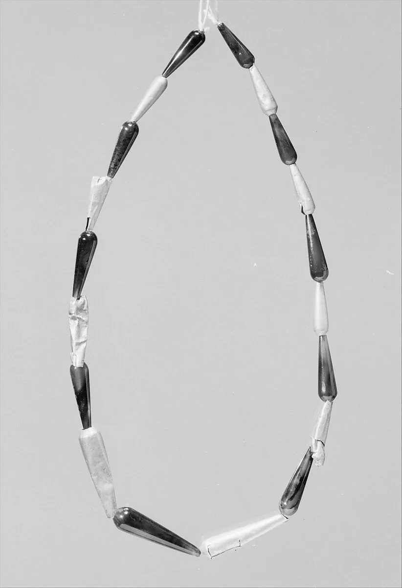 Nineteen Drop Beads here Strung as a Necklace — Unknown