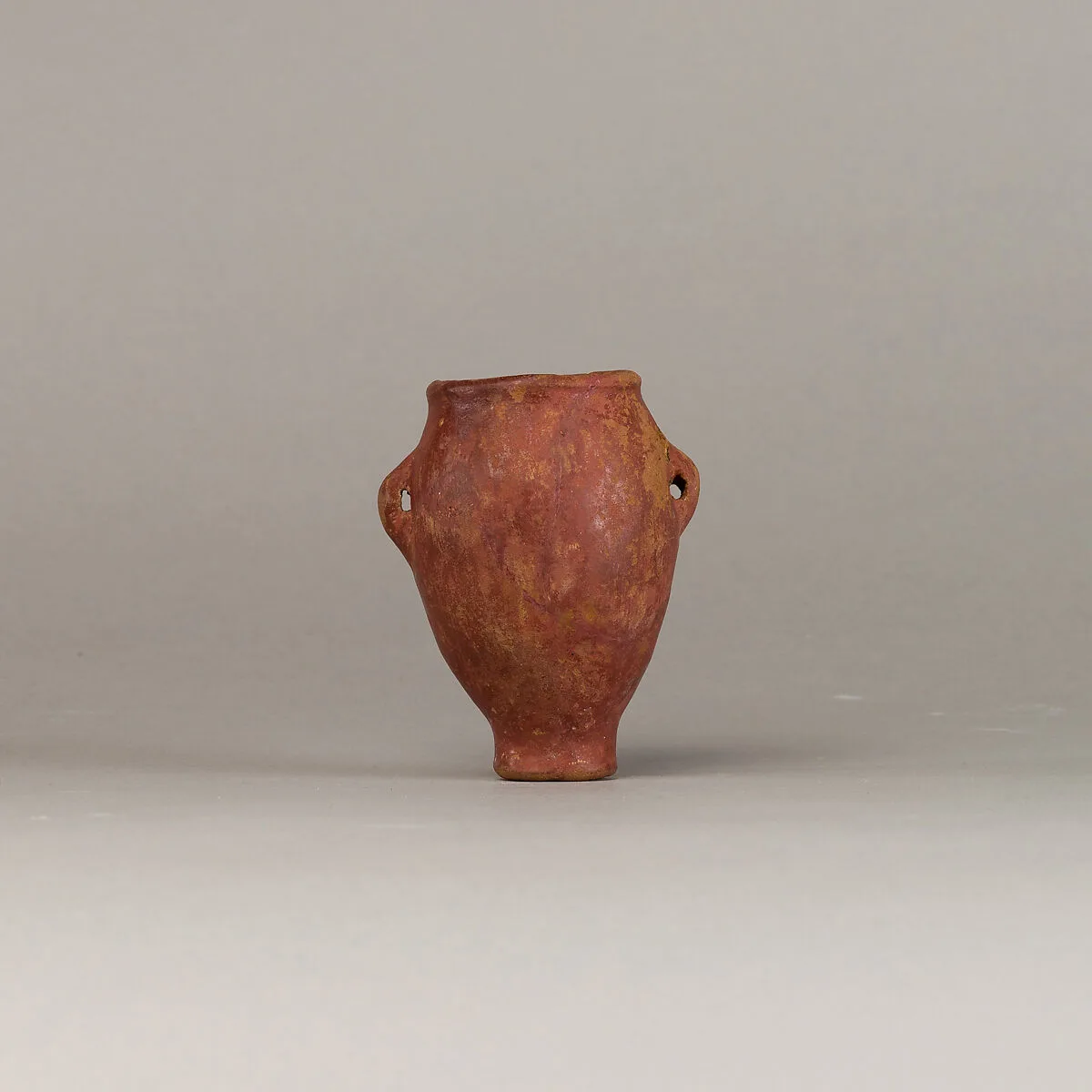 Polished red ware jar with lugs — Unknown