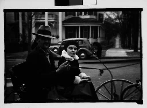 [Man and Two Young Women in Horse-Drawn Carriage, Milledgeville, Georgia]
