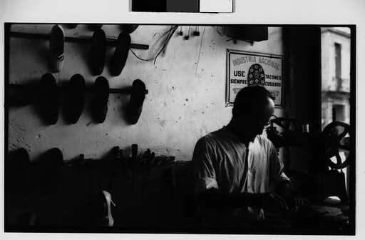 [Cobbler Working in Shop, Havana]