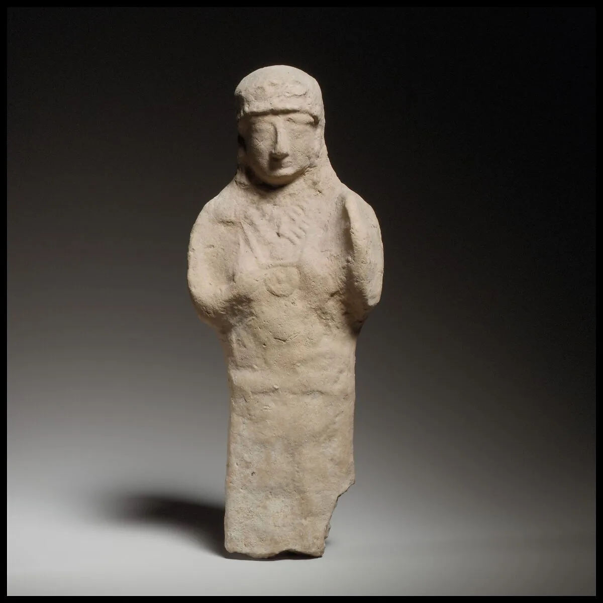 Standing female figurine — Unknown
