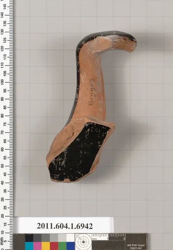 Terracotta fragment of a kylix (drinking cup)