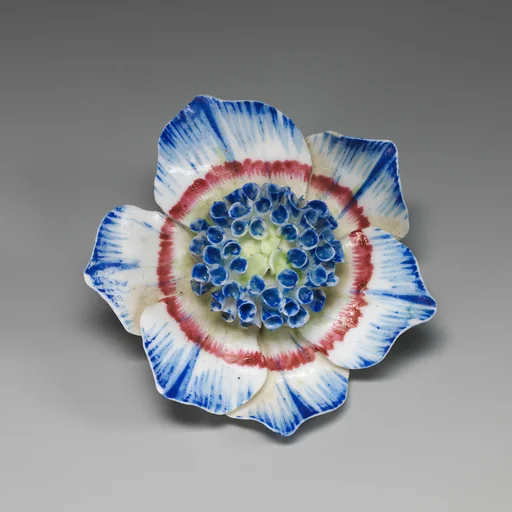 Porcelain flower (one of a set of nine)
