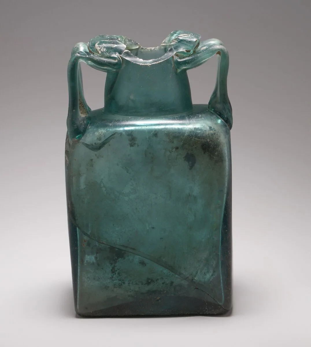 Glass rectangular bottle — Unknown
