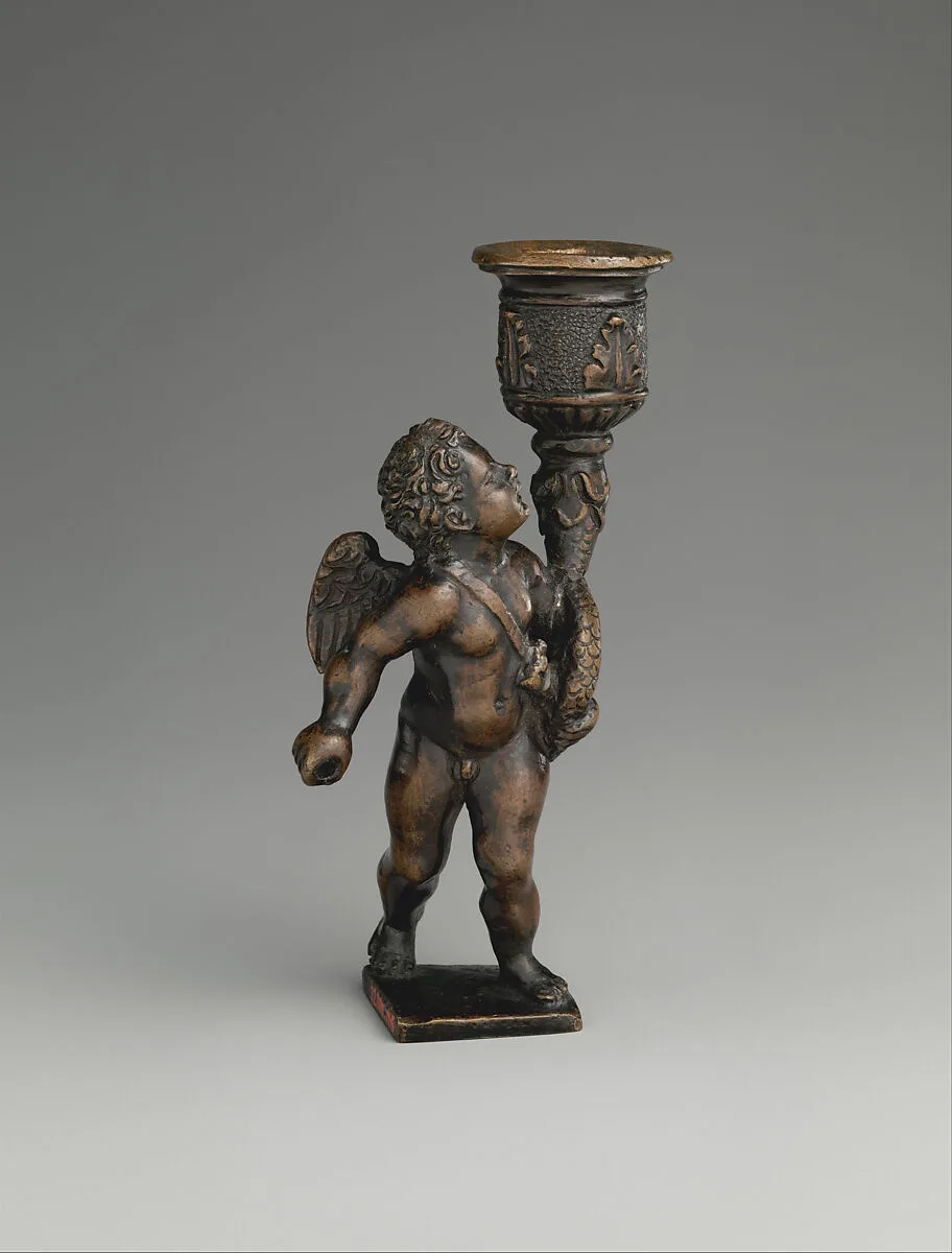 Cupid bearing a quiver and a candle socket — Unknown