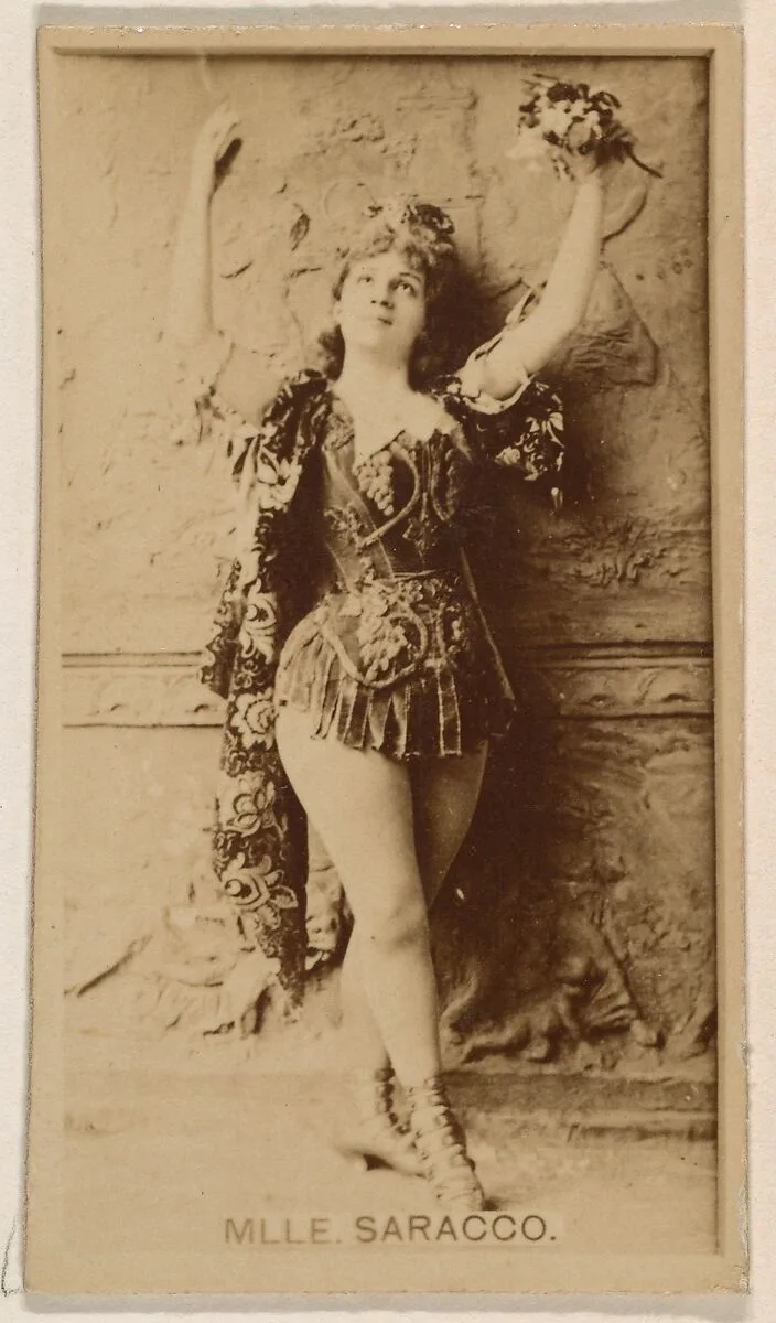 Mlle. Elisa Saracco, from the Actresses series (N245) issued by Kinney Brothers to promote Sweet Caporal Cigarettes — Kinney Brothers Tobacco Company