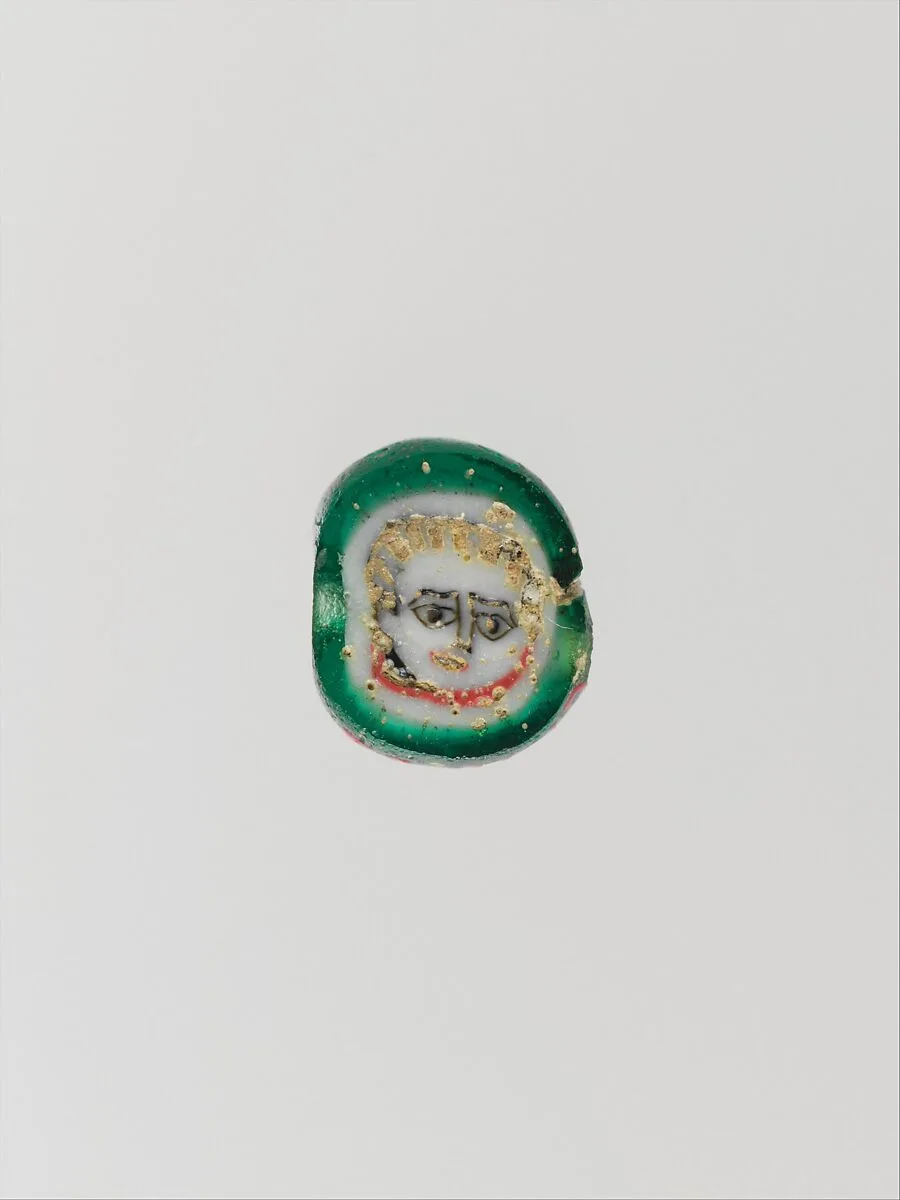 Glass mosaic face bead — Unknown