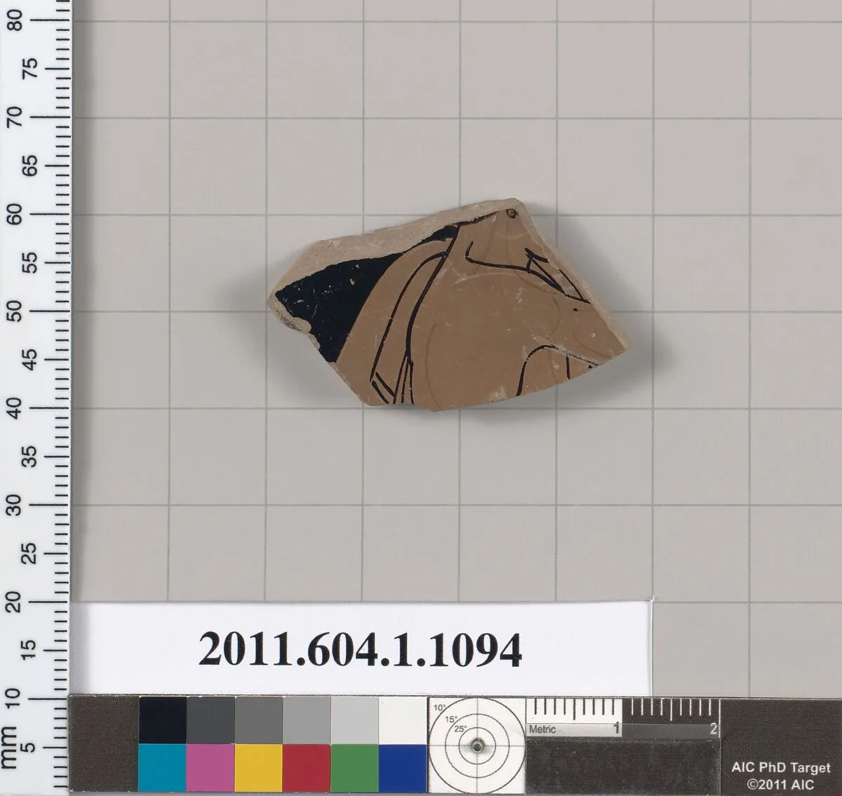 Terracotta fragment of a kylix (drinking cup) — Makron