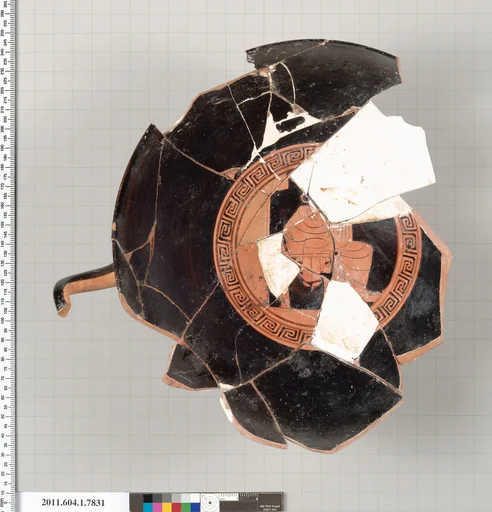 Terracotta fragment of a kylix (drinking cup)