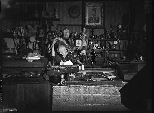 [Junk Shop Owner with Parrot on Shoulder, Williamsburg, Brooklyn]