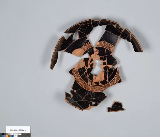 Terracotta fragment of a kylix (drinking cup)