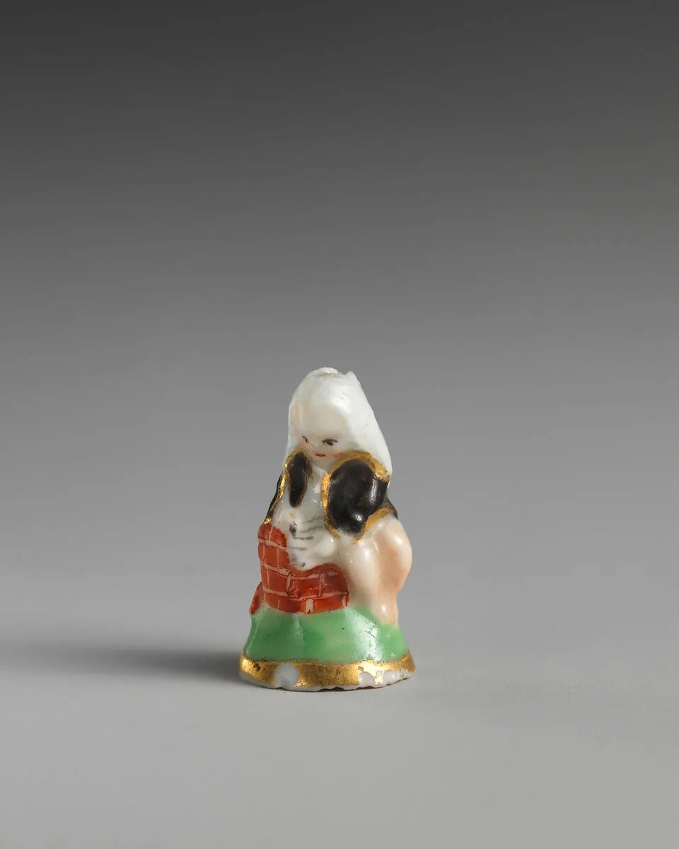 Miniature seal in the form of Cupid disguised as a barrister — Derby Porcelain Manufactory