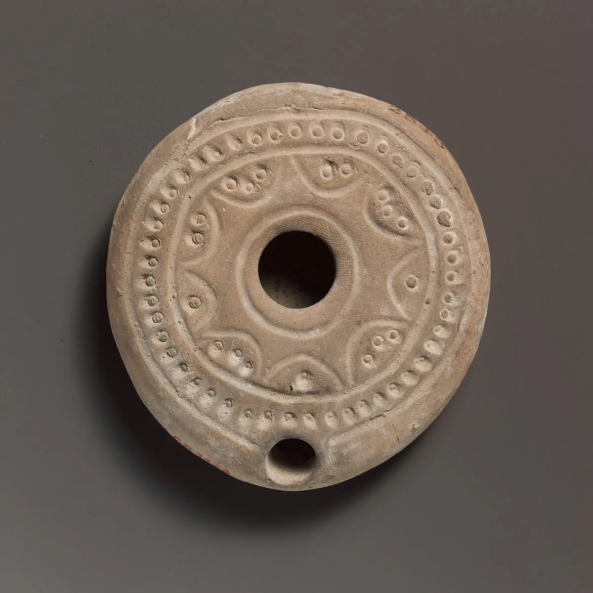 Terracotta oil lamp — Unknown