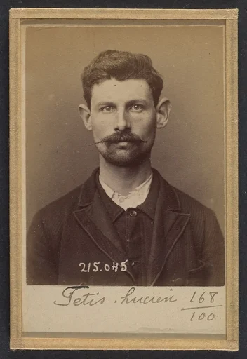 Fétis. Julien. 26 ans, né à New York (USA). Couvreur. Anarchiste. 3/3/94.