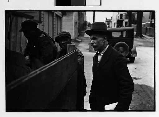 [Three 35mm Film Frames: Men on Sidewalk, Hudson, New York]