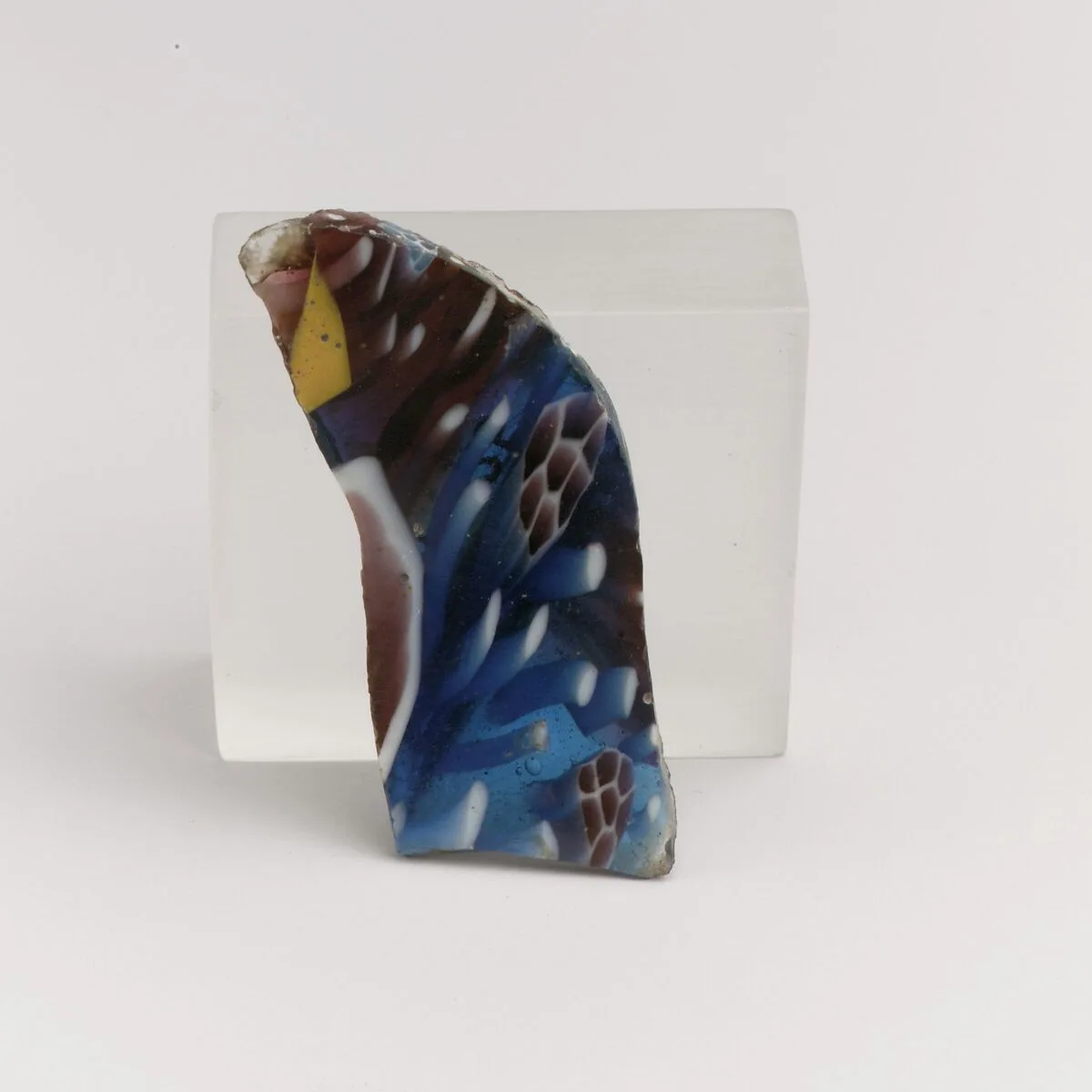 Glass mosaic ribbed bowl fragment — Unknown