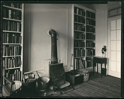[Interior View of Walker Evans's Apartment at 441 East 92nd Street Showing Fireplace and Library, New York City]