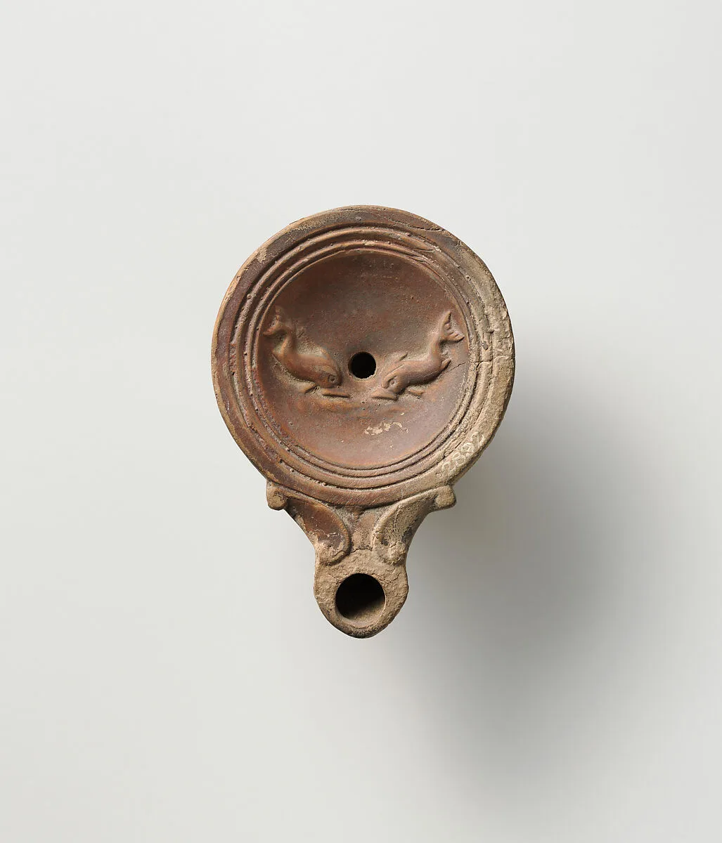 Terracotta oil lamp — Unknown