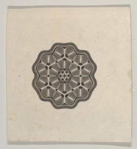 Banknote motif: a small six lobed ornament with a rope border, the interior adorned with lathe work florets