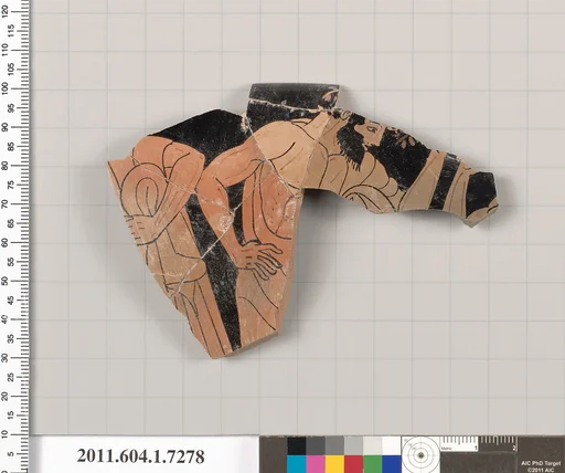 Terracotta rim fragment of a kylix (drinking cup)