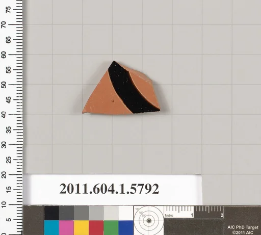 Terracotta fragment of a kylix: eye-cup (drinking cup)