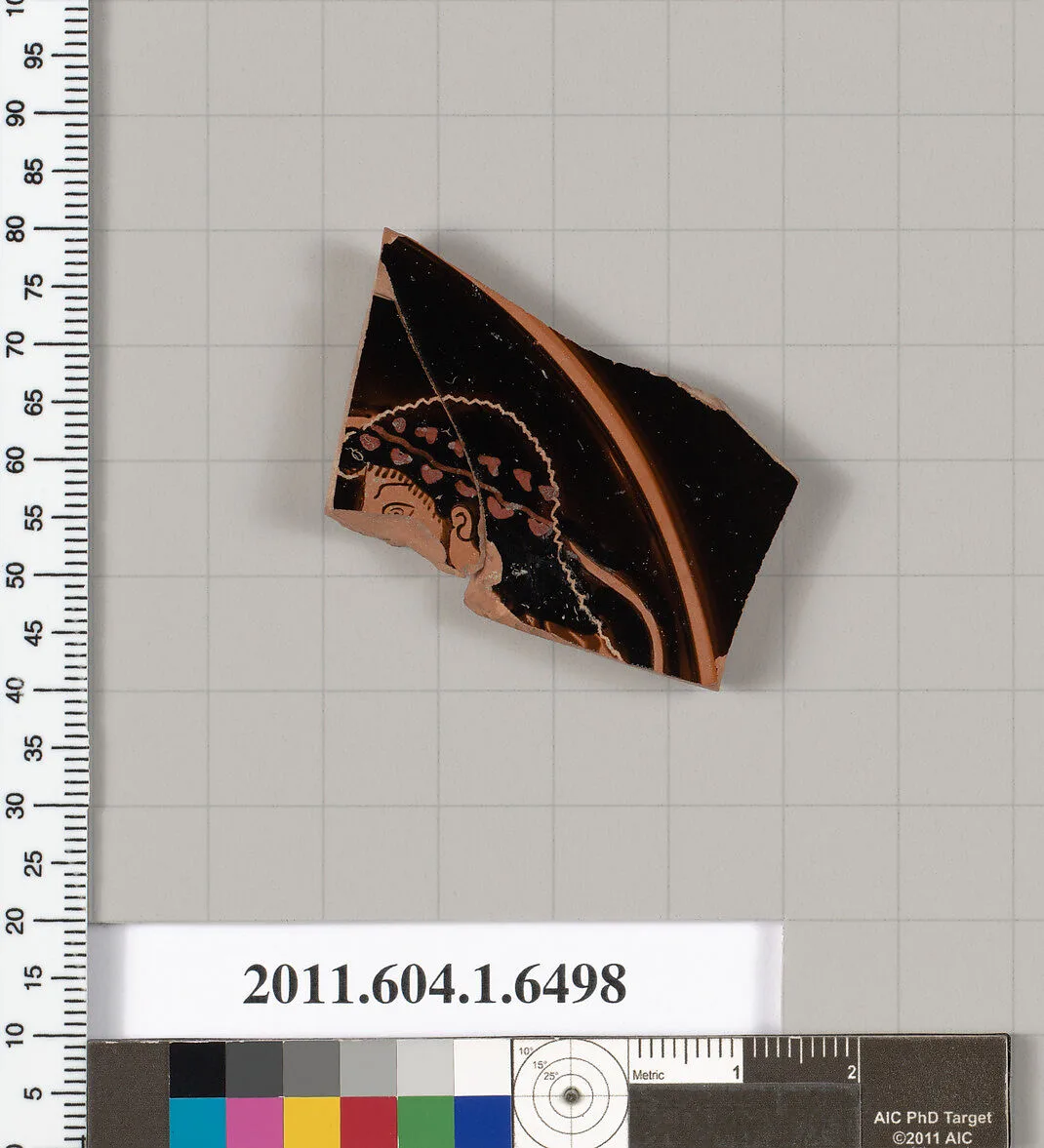 Terracotta fragment of a kylix (drinking cup) — Colmar Painter