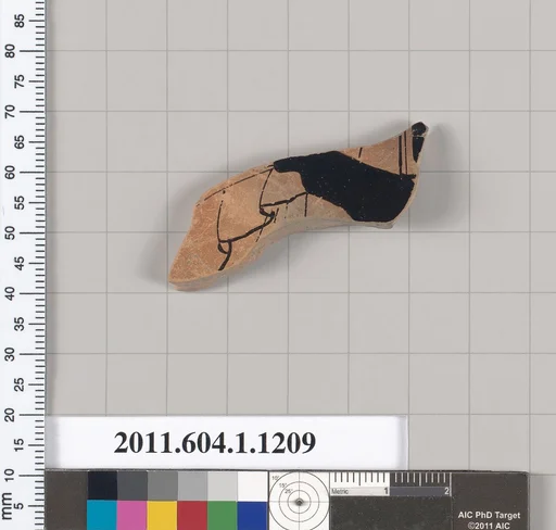Terracotta fragment of a kylix (drinking cup)