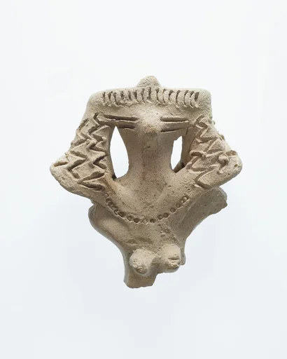 Upper Half of a Female Figurine