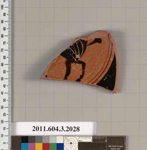 Terracotta fragment of a kylix (drinking cup)