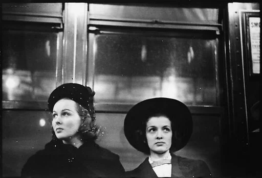[Five 35mm Film Frames: Subway Passengers, New York City: Two Young Women]